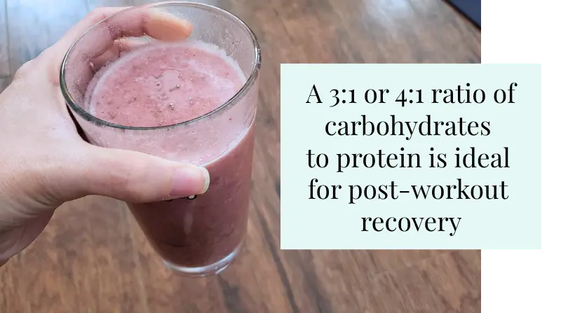 post workout recovery shake being held in hand with text to have protein and carbs after workout