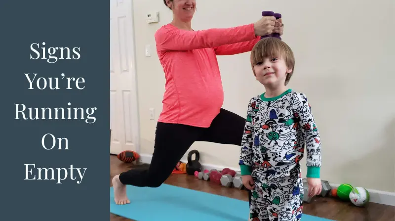 bethany working out with child standing in foreground