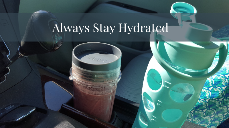 water bottle in car along with protein shake in other cup holder with text overlay always stay hydrated