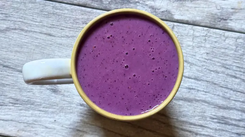 top view of blended kachava shake in mug